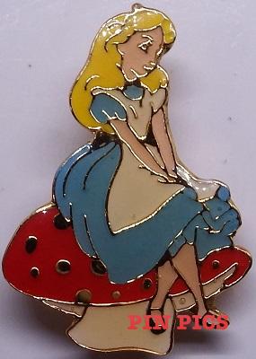 Alice in Wonderland sitting on red mushroom
