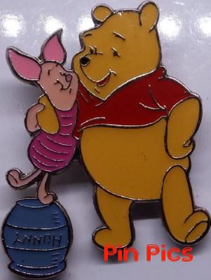 Pooh with Piglet standing on hunny pot