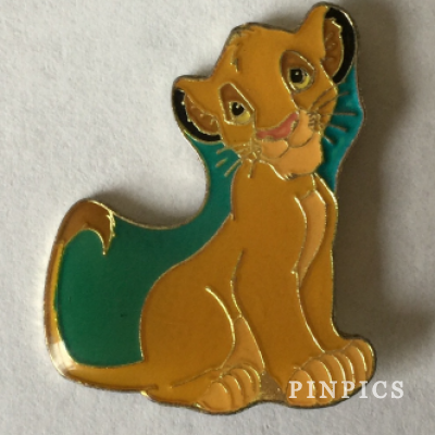 Young Simba Sitting with Teal Background 