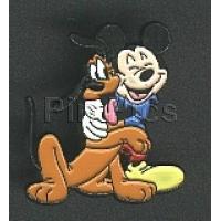 Mickey Mouse hugging Pluto