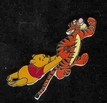 Pooh Hanging on to Tigger Running with a Football