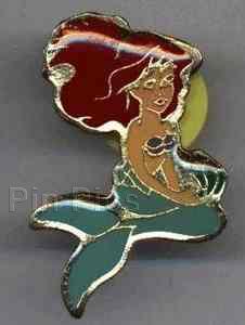Ariel sitting with flower -- small, gold-outlined pin
