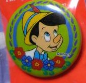 Button - JDS Countdown 2000 - Pinocchio in Flower Border